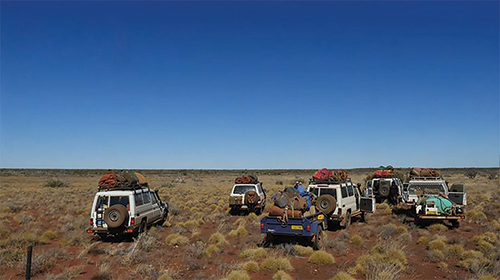 Six vehicles with camping gear on the Mala trip