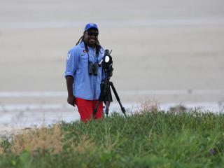 Lama Lama Ranger Daniel Peter doing a bird survey. Photo: © Wilfred Peter