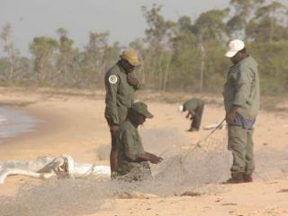 Removing fishing nets. Photo © Bawinanga Aboriginal Corporation