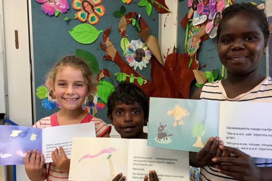 Shepherdson College students Martha Hewett, Joshua Garrawurra and Kiki Gawla display their artwork for Badurru