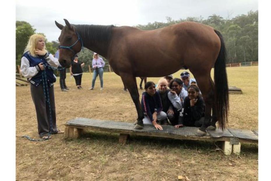 Group of children with horse